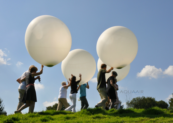 Ballonverstrooiing asverstrooiing per heliumballon van vader en moeder